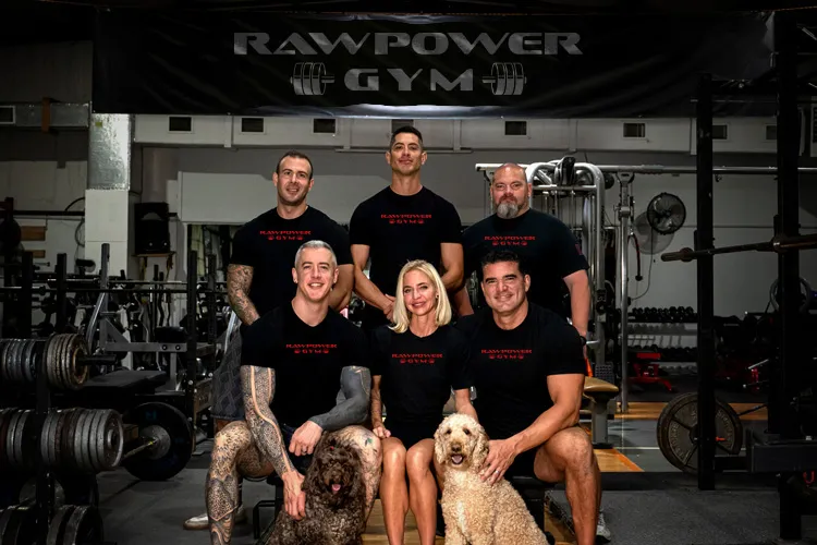 The six coaches of Spicewood Fitness together on the gym floor.